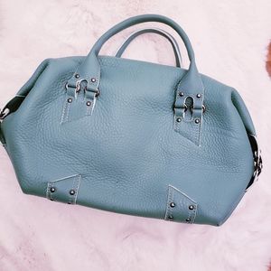 Cole Haan handbag in a light teal color